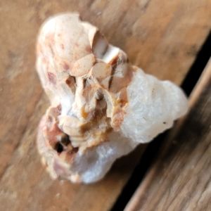 Natural heart shaped geode Quartz crystal, pink hues on top